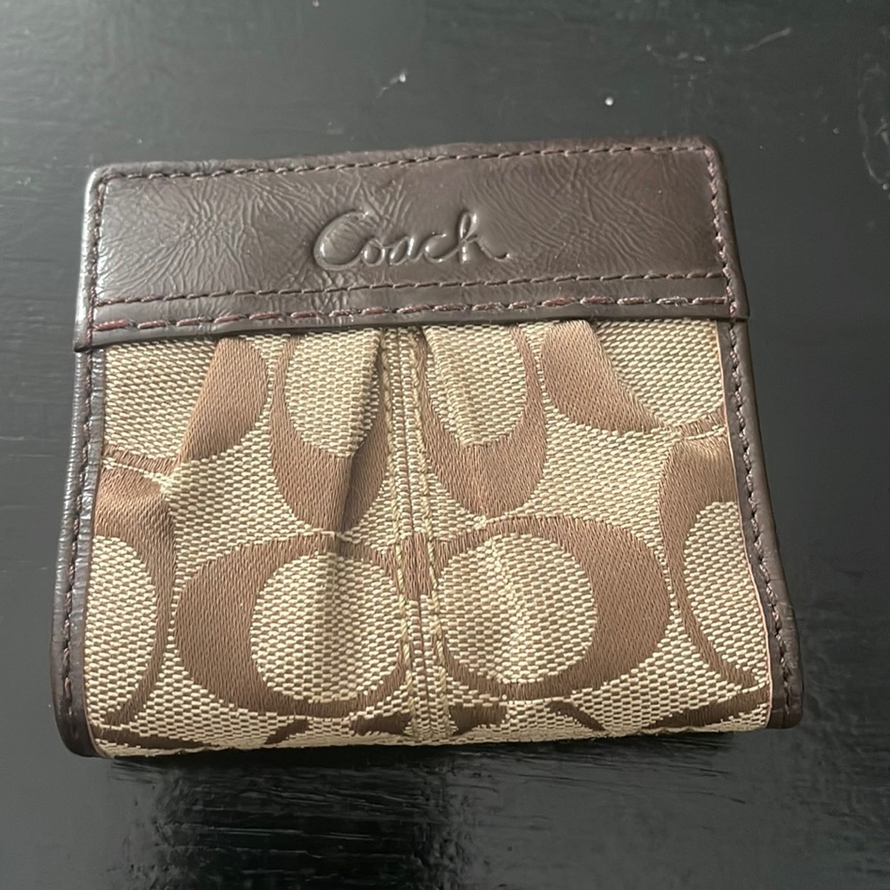 Coach small wallet. Brown coach fabric. Good condition.